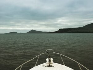 riding a boat to Florentina Island in galapagos