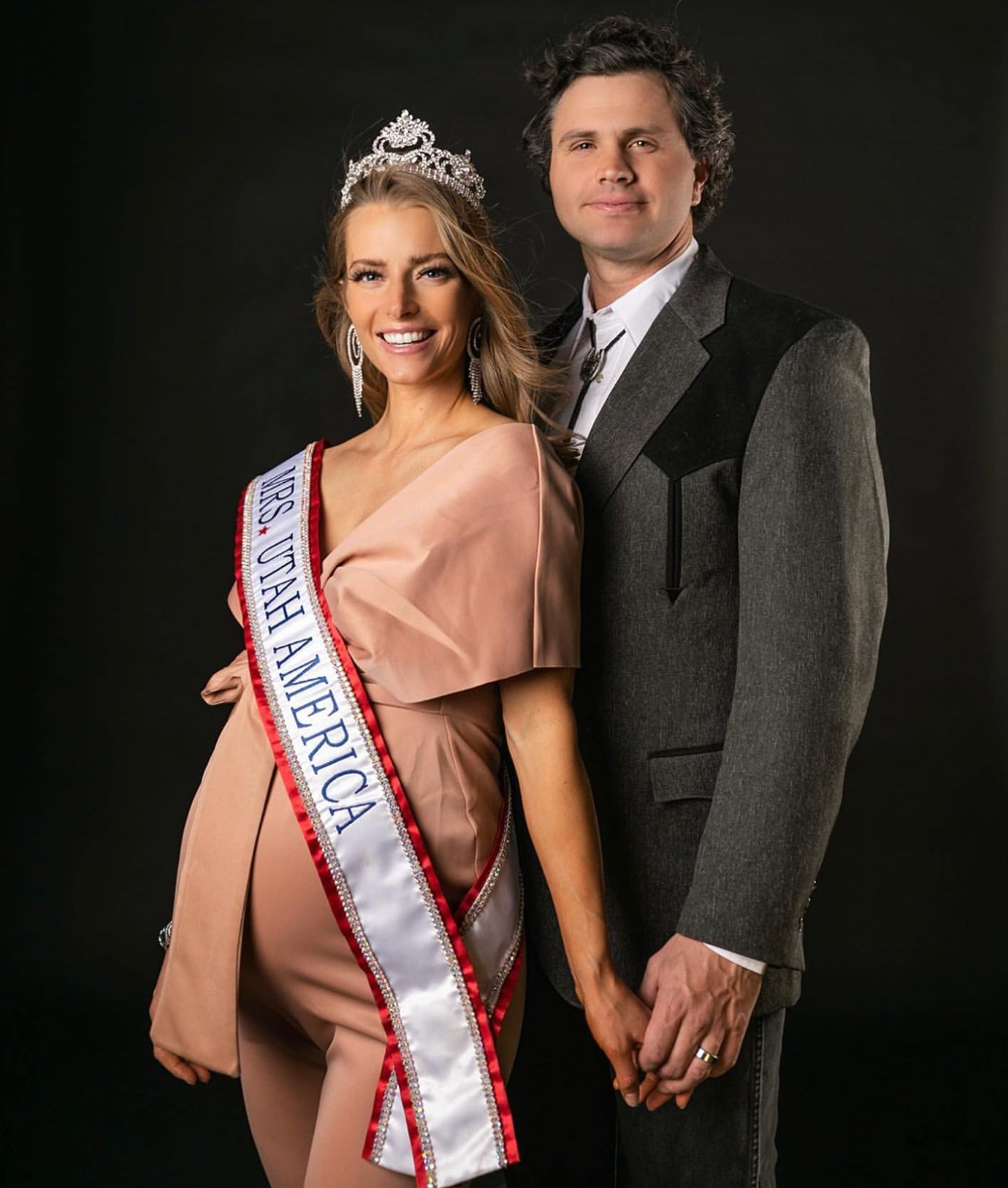 hannah and her husband pose after a beauty pageant 